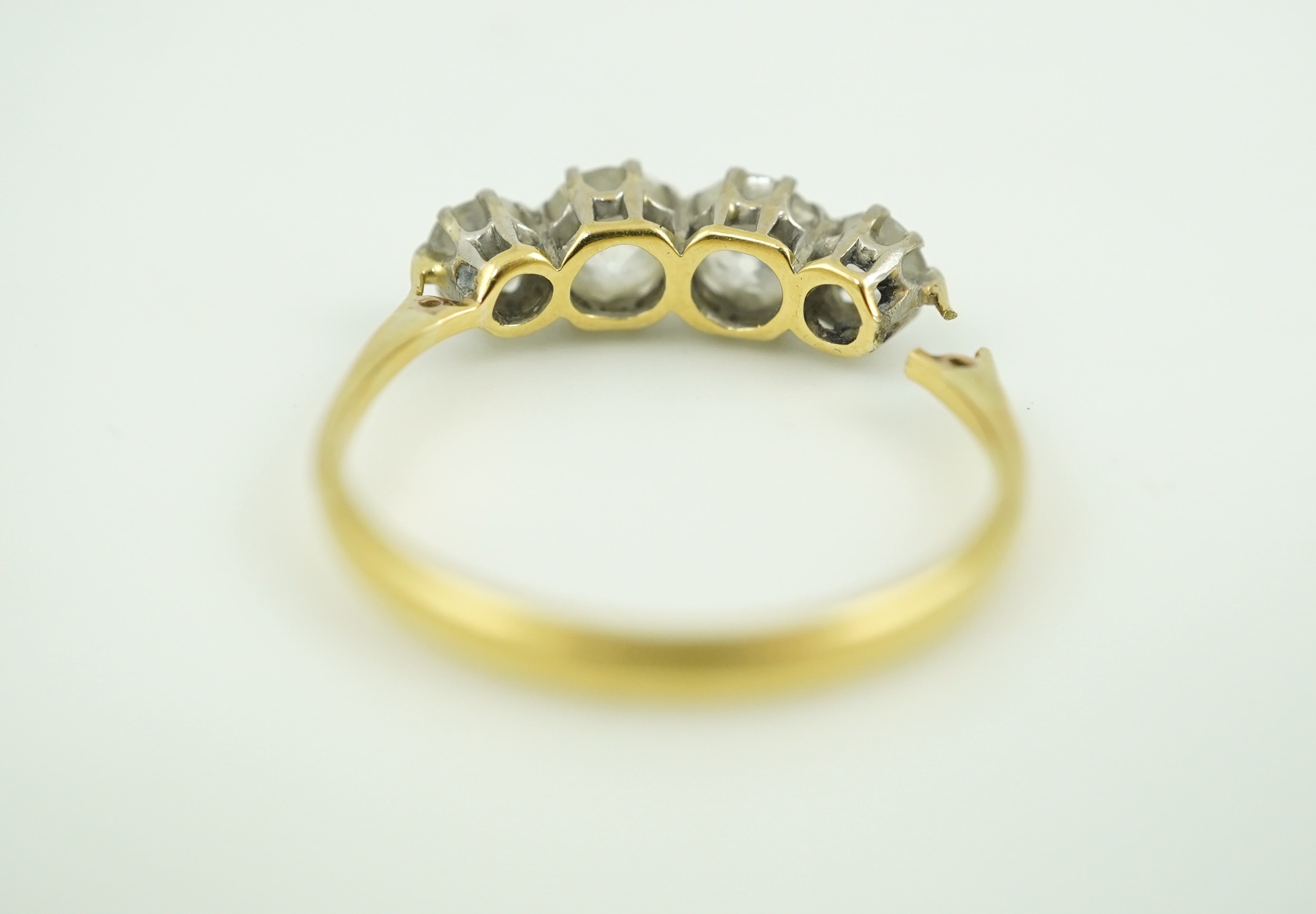 A four-stone diamond ring, early 20th century